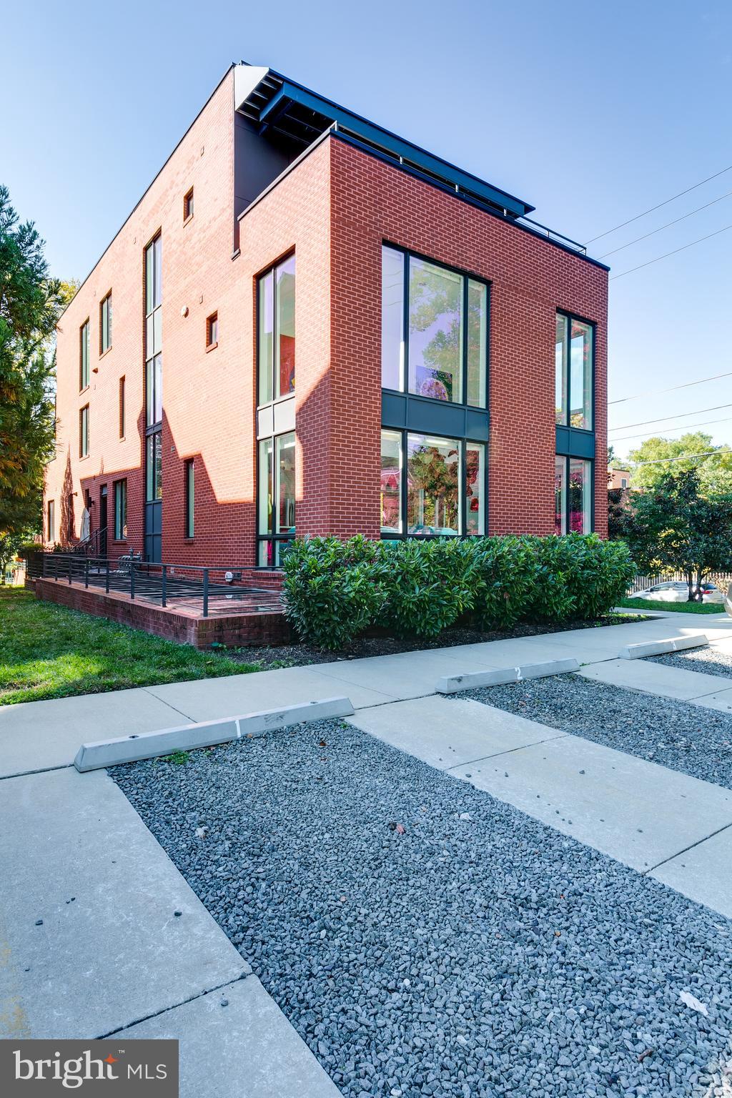 4529 MacArthur Boulevard Northwest, Unit 3 Washington, DC 20007 - Photo 50 of 50 a view of a big house with a yard