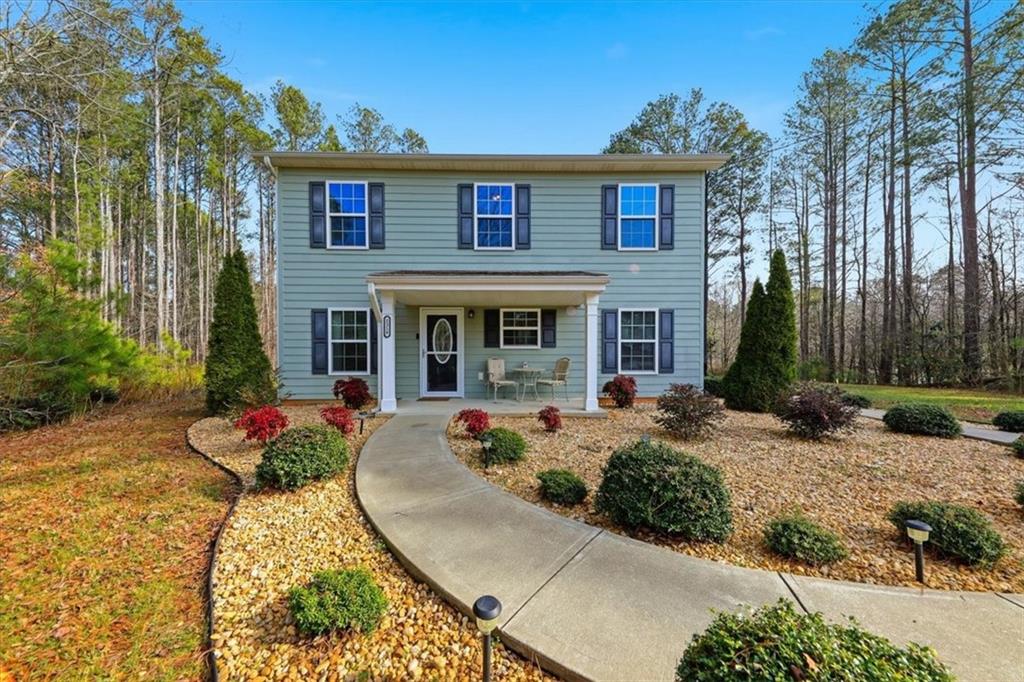 1318 Reece Road Woodstock, GA 30188 - Photo 2 of 40 front view of a house with a yard
