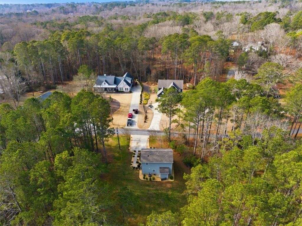 1318 Reece Road Woodstock, GA 30188 - Photo 37 of 40 a aerial view of a house with yard swimming pool and mountain view