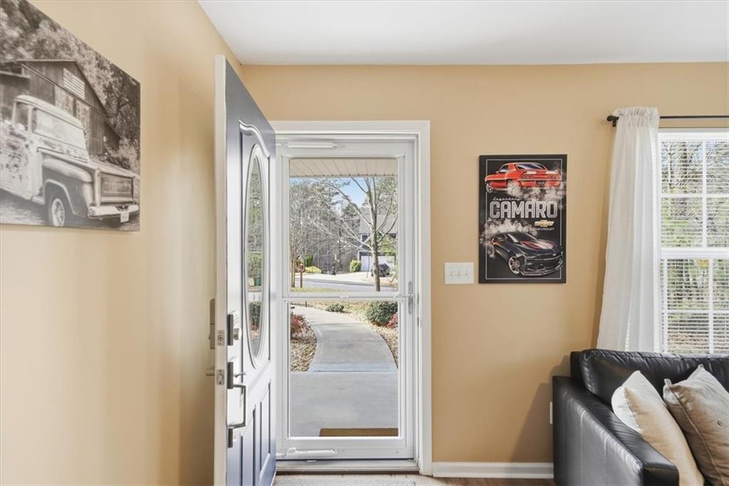 1318 Reece Road Woodstock, GA 30188 - Photo 6 of 40 a view of a livingroom with a couch