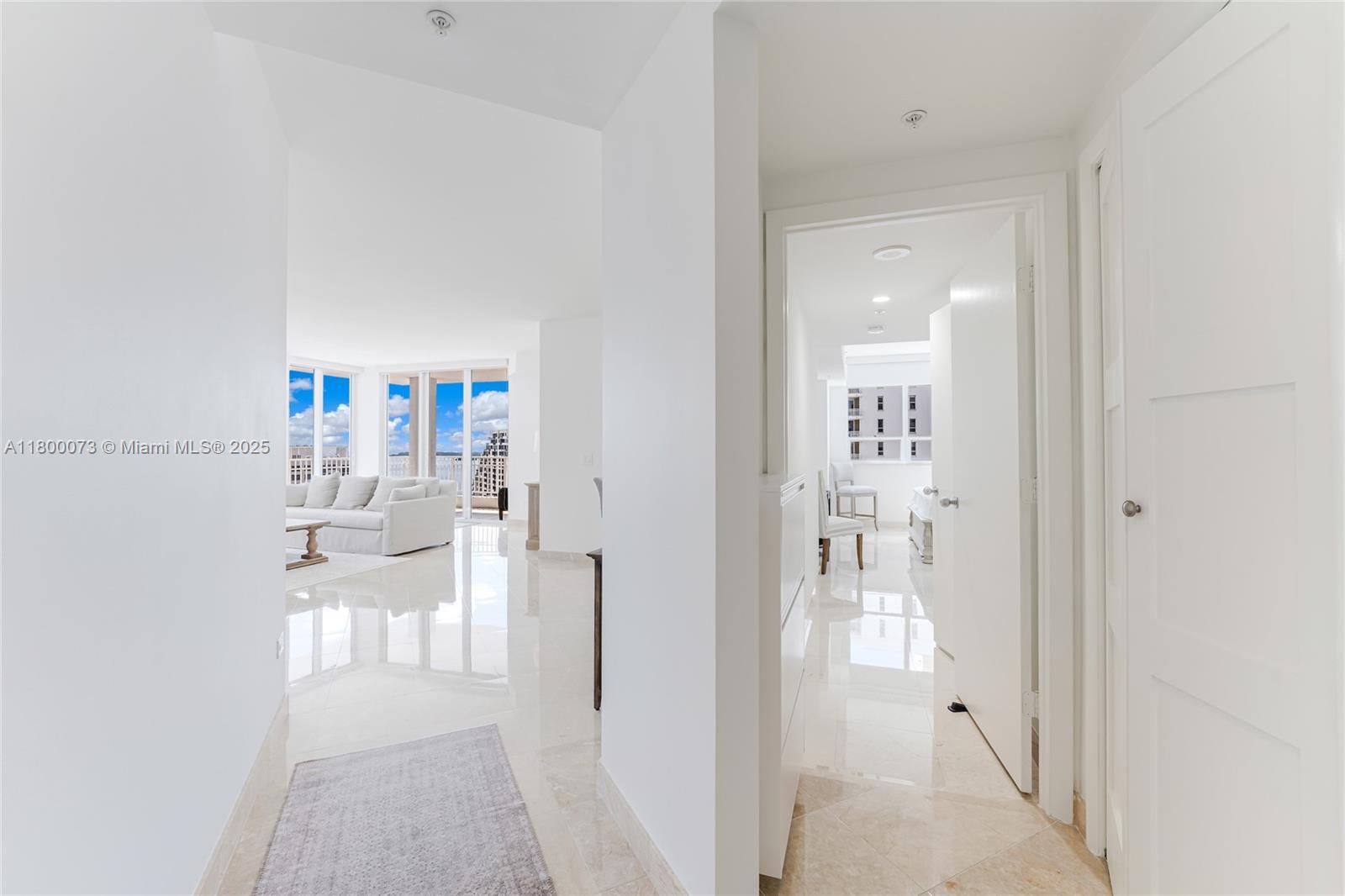 801 Brickell Key Boulevard, Unit 1911 Miami, FL 33131 - Photo 19 of 21 a view of dining room with floor to ceiling window