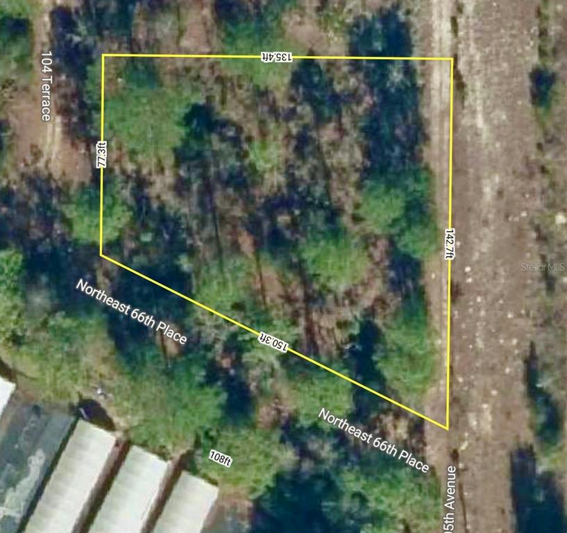 0 66th Place Northeast Bronson, FL 32621 - Photo 3 of 12 a view of a forest from a balcony