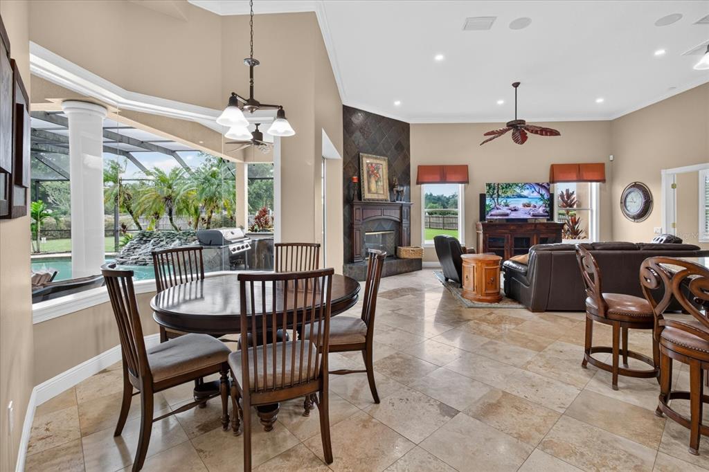 9427 Eddings Road Odessa, FL 33556 - Photo 28 of 93 a view of a dining room with furniture window and outside view