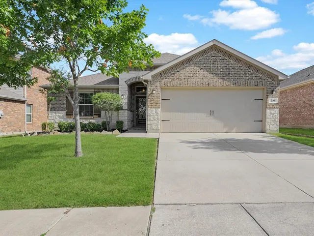front view of house with a yard