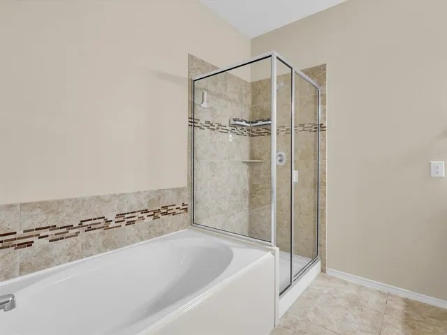 a bathroom with a sink vanity and a toilet