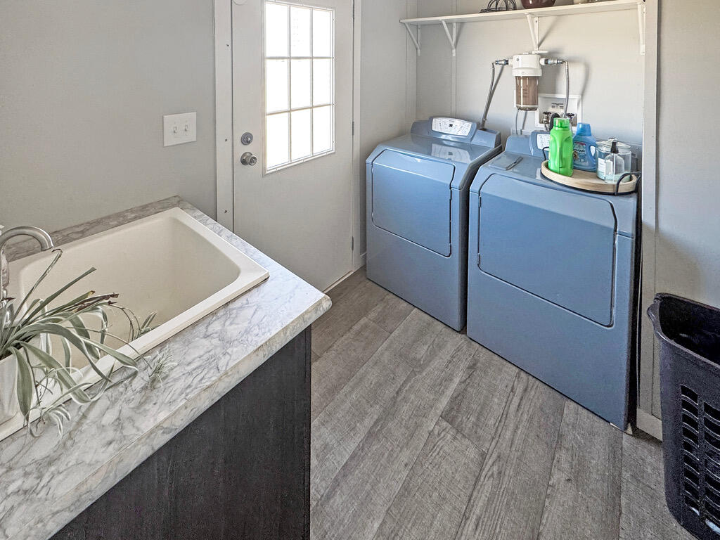 349 Private Road, Unit 243P Seminole, TX 79360 - Photo 22 of 24 a utility room with washer and dryer