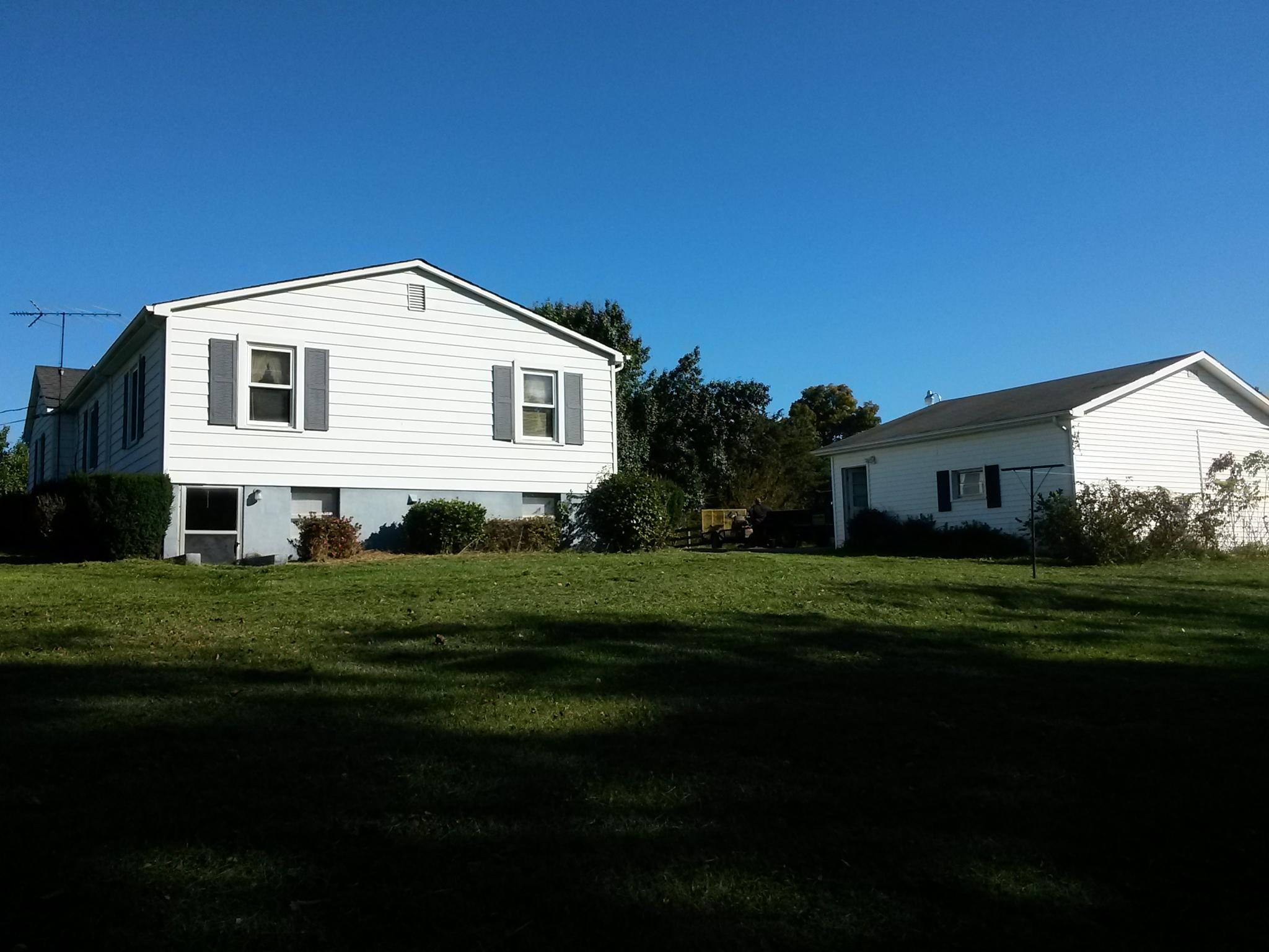 1020 Muse Field Road Rocky Mount, VA 24151 - Photo 12 of 43 a front view of a house with a yard