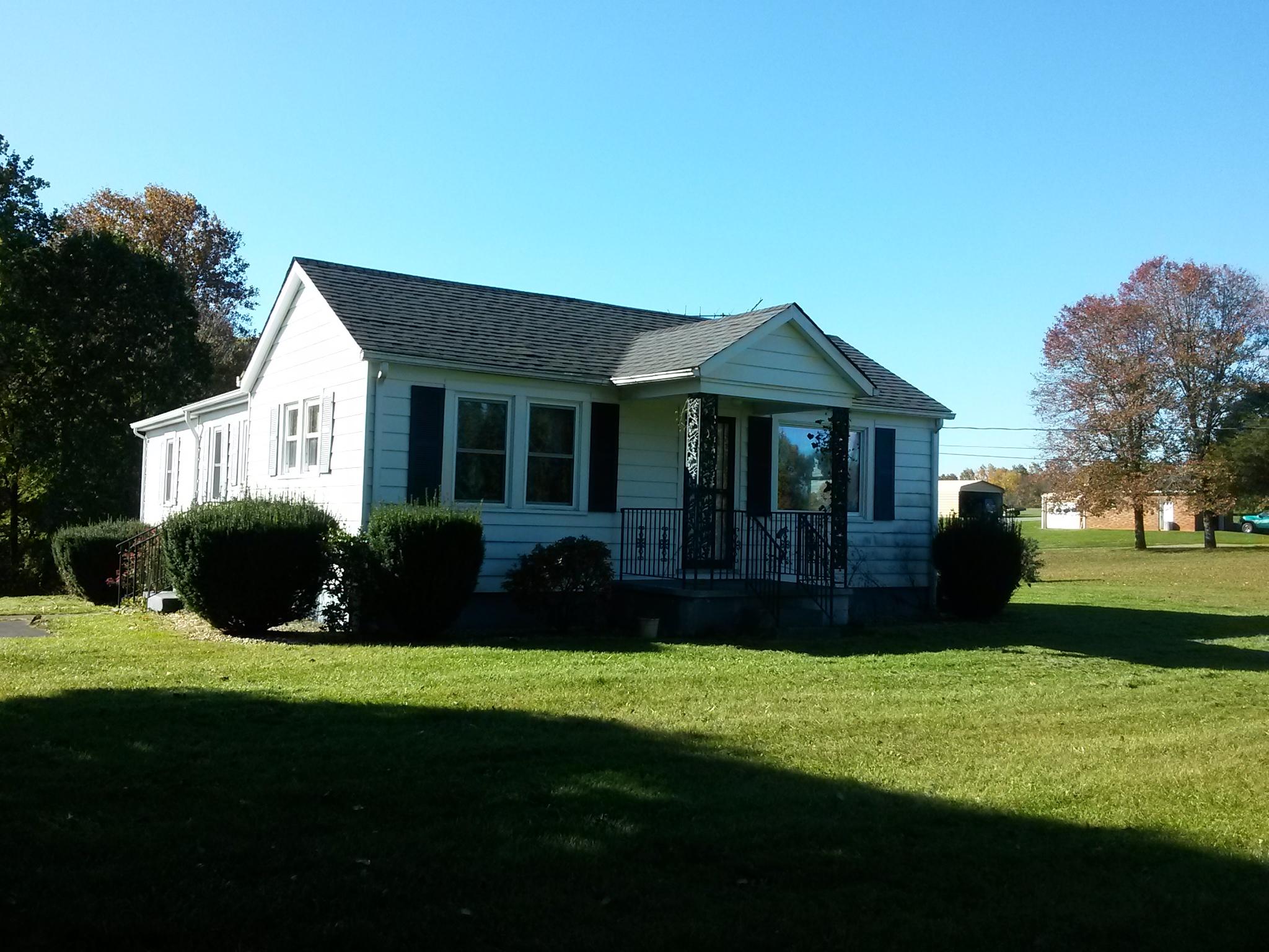 1020 Muse Field Road Rocky Mount, VA 24151 - Photo 14 of 43 a front view of a house with a garden