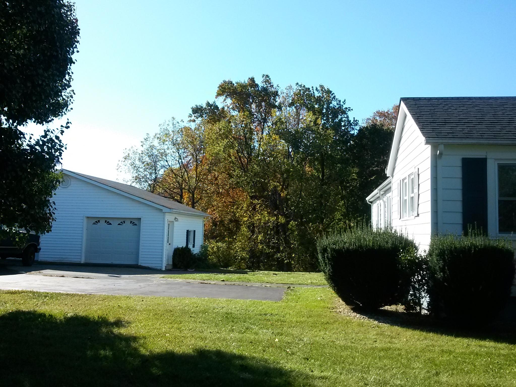 1020 Muse Field Road Rocky Mount, VA 24151 - Photo 15 of 43 a view of a house with backyard and sitting area