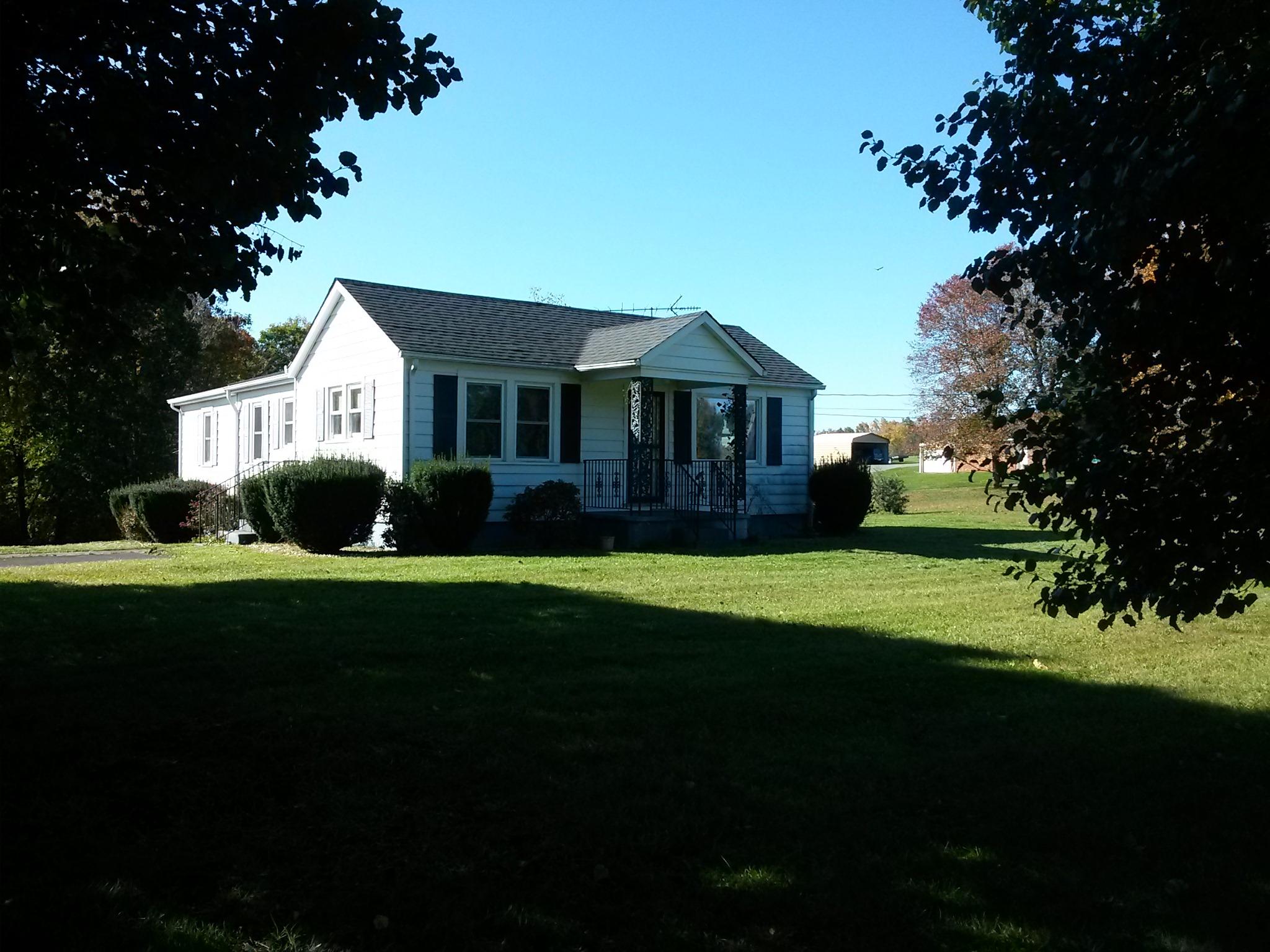 1020 Muse Field Road Rocky Mount, VA 24151 - Photo 22 of 43 a front view of a house with a garden