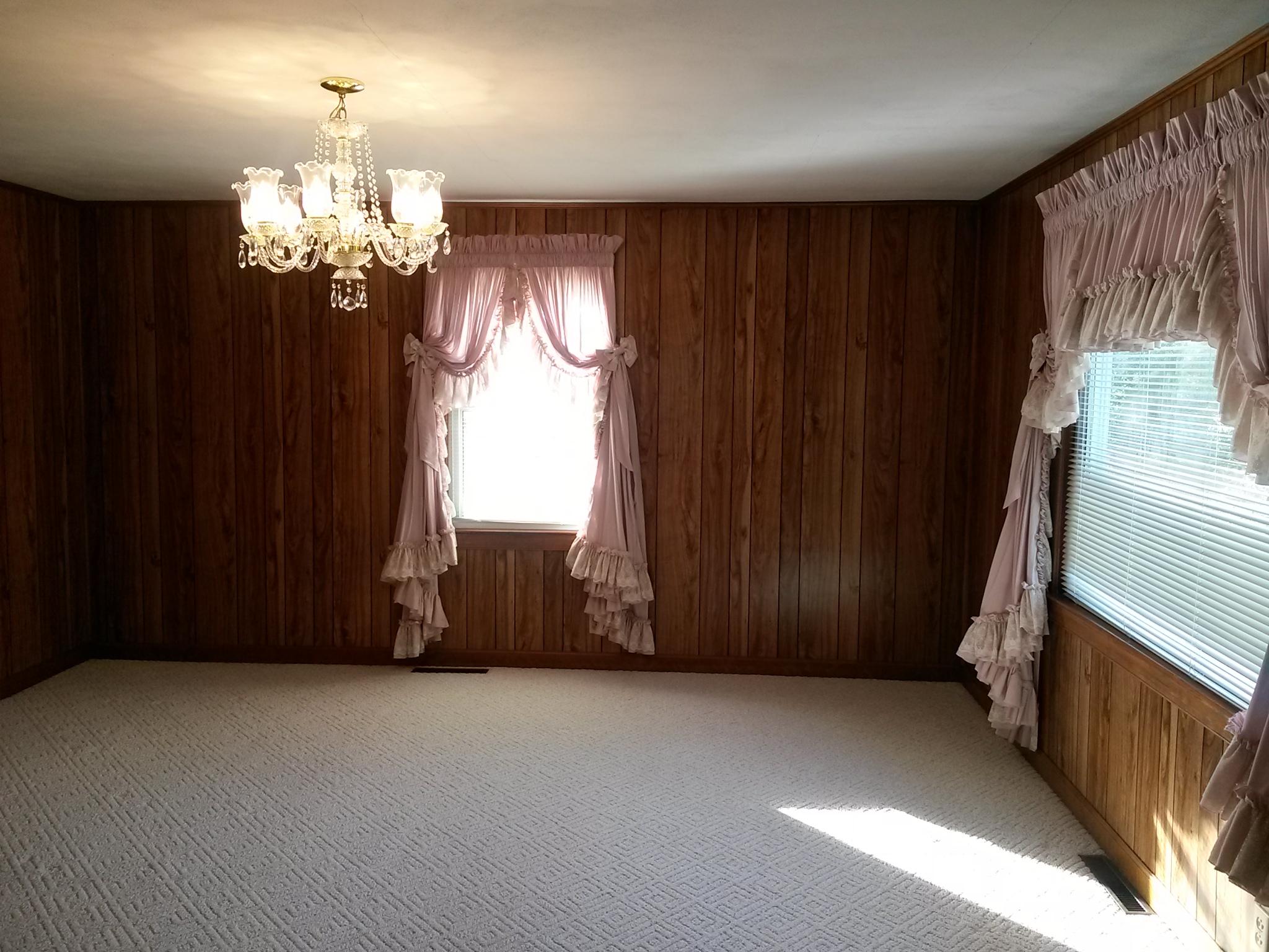 1020 Muse Field Road Rocky Mount, VA 24151 - Photo 24 of 43 a view of a porch with a window and chandelier