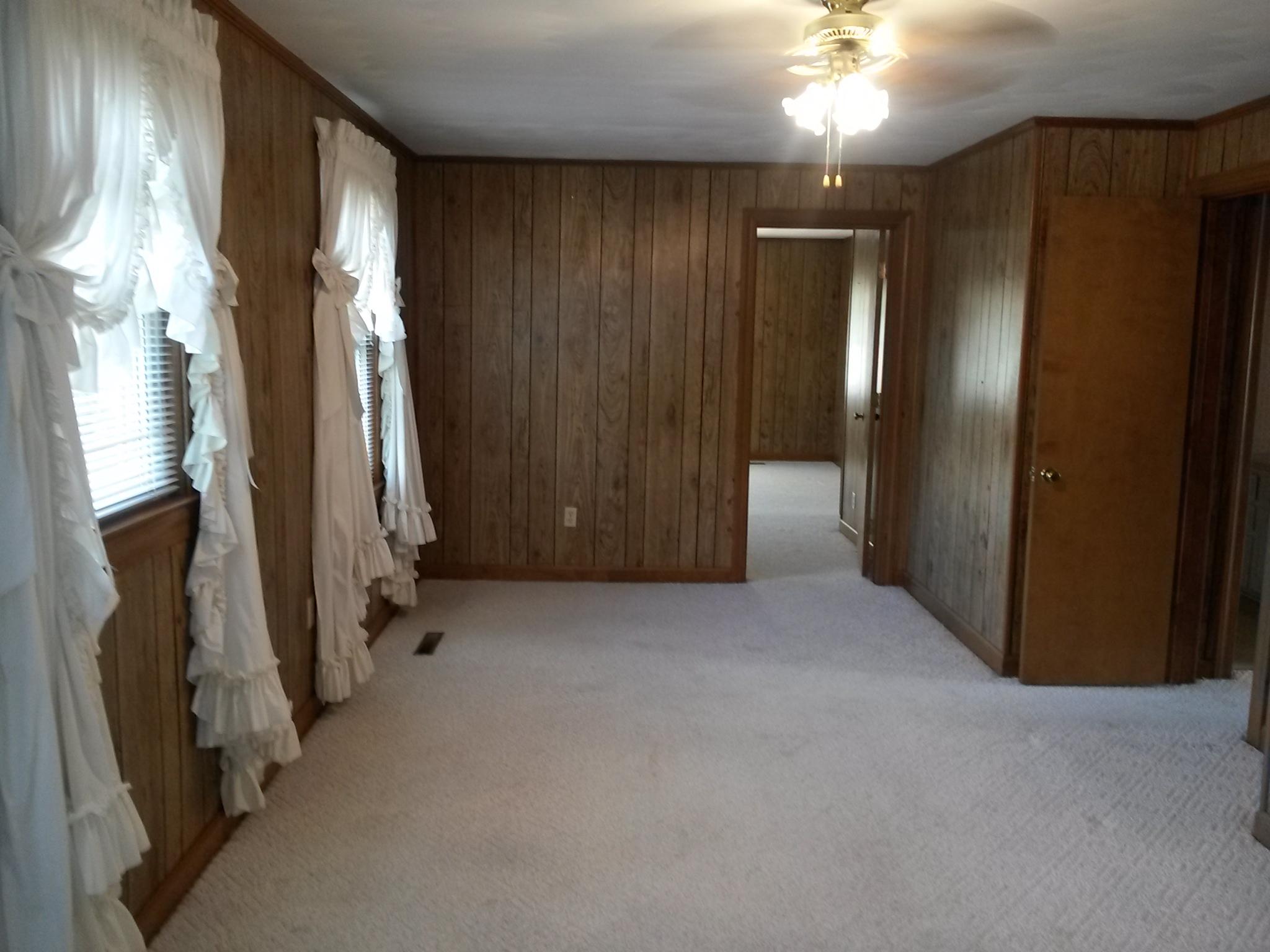 1020 Muse Field Road Rocky Mount, VA 24151 - Photo 32 of 43 a view of an empty room with a fireplace