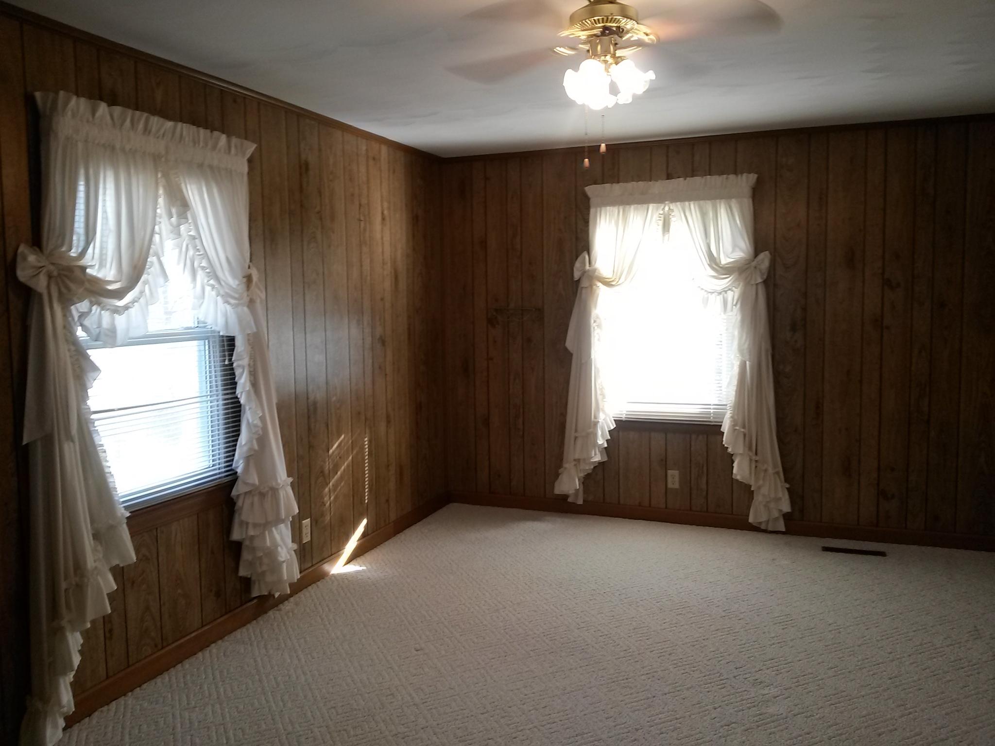 1020 Muse Field Road Rocky Mount, VA 24151 - Photo 33 of 43 a view of empty room with a ceiling fan and window