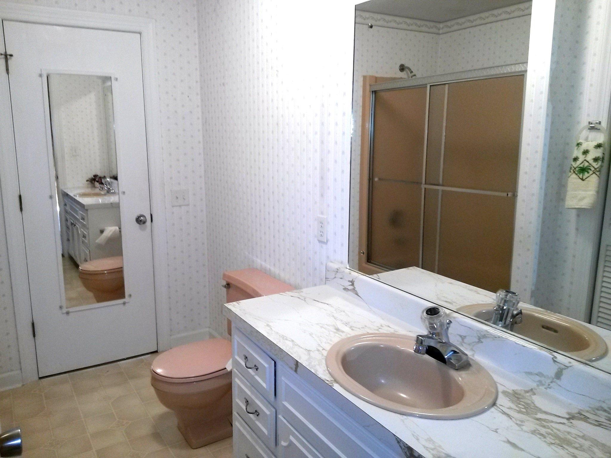 1020 Muse Field Road Rocky Mount, VA 24151 - Photo 40 of 43 a bathroom with a granite countertop sink toilet and shower