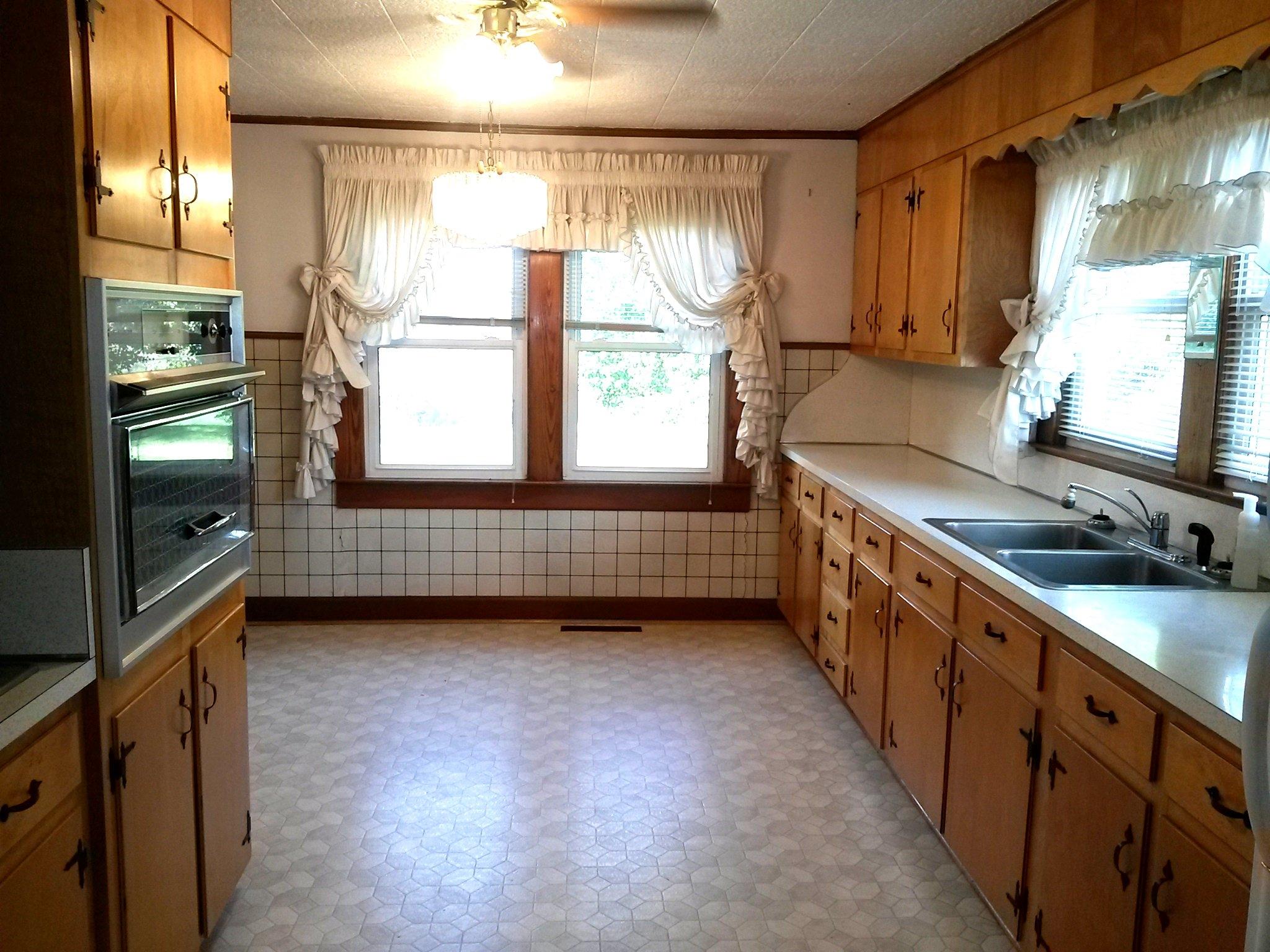 1020 Muse Field Road Rocky Mount, VA 24151 - Photo 43 of 43 a kitchen with stainless steel appliances granite countertop a sink and a stove