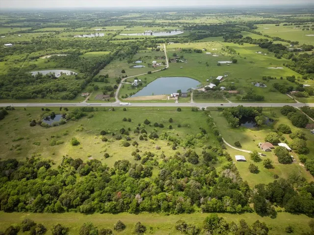 a view of an ocean and a yard