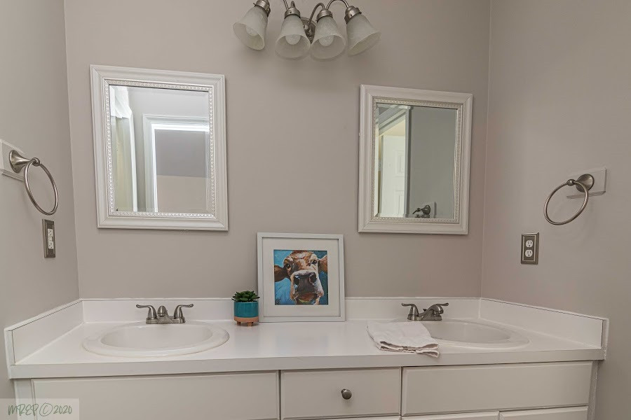 5960 Covered Bridge Road Clayton, NC 27527 - Photo 19 of 30 Master bathroom with double sinks. Freshly painted cabinets and new hardware. Master Bath/Spa