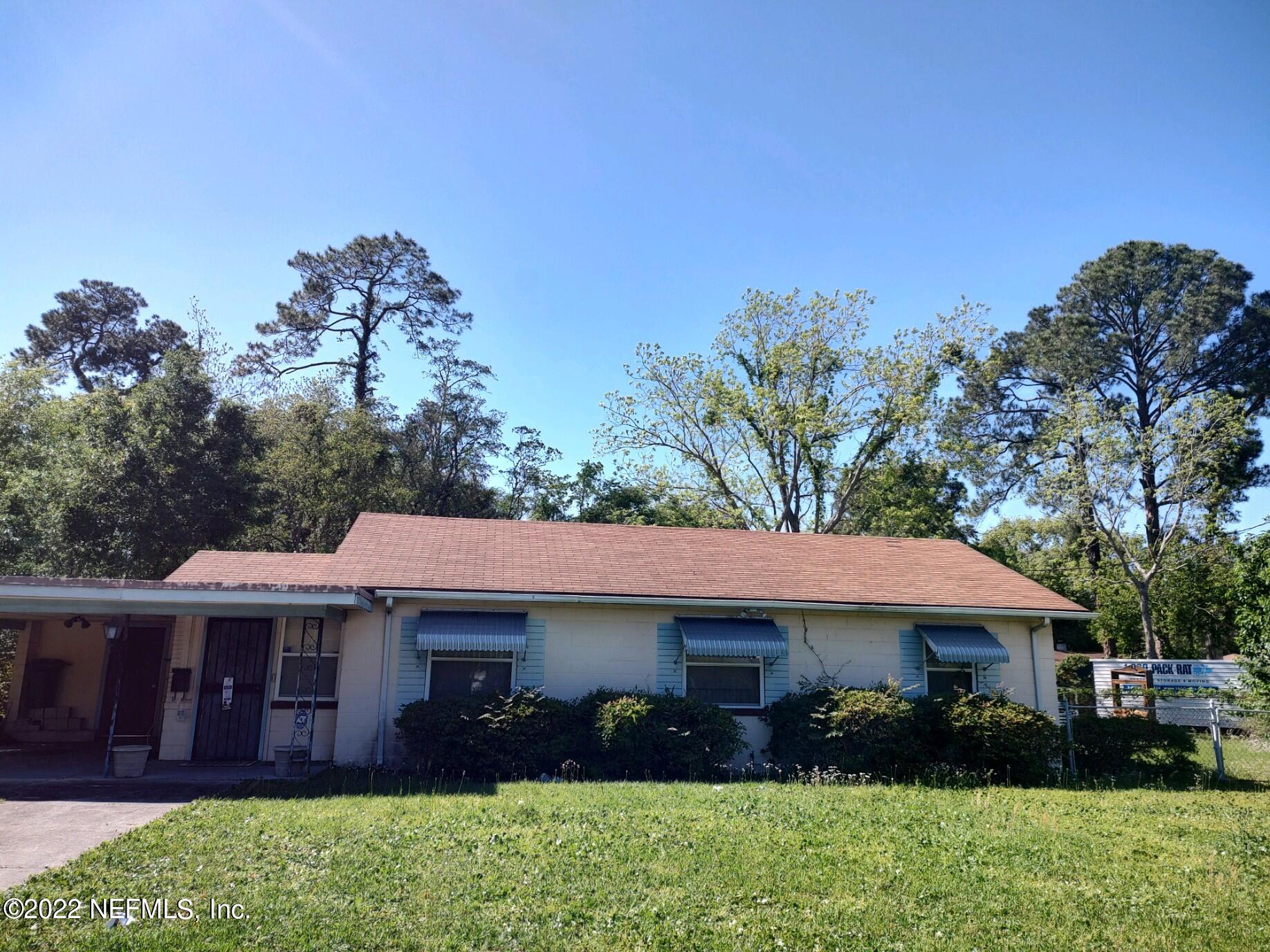 2239 Cato Road Jacksonville, FL 32207 - Photo 1 of 13 a view of house with a yard