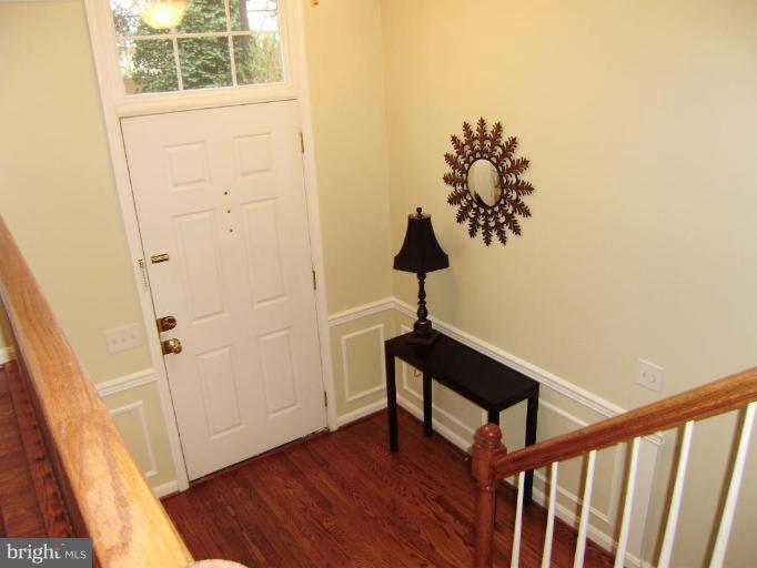 6011 Riddle Walk Alexandria, VA 22312 - Photo 2 of 25 Decorative detailing and a glass transom are great