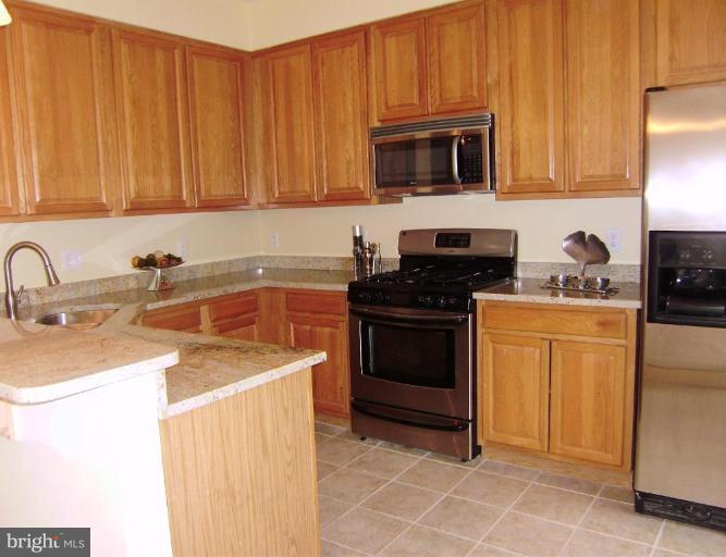 6011 Riddle Walk Alexandria, VA 22312 - Photo 10 of 25 Cook in style and look at the new floor!