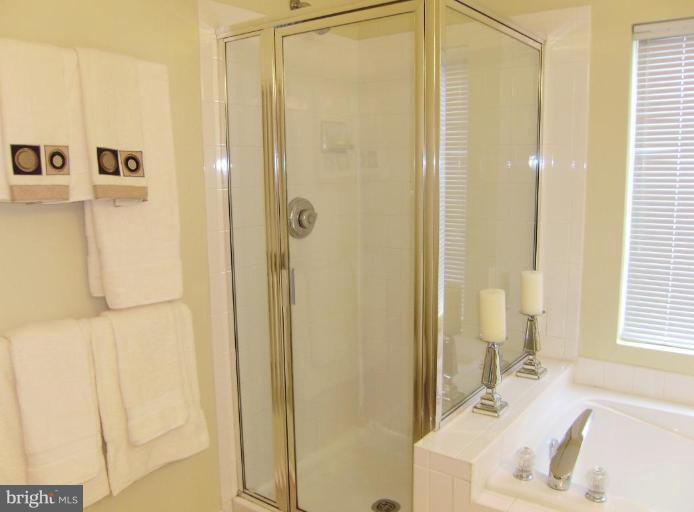 6011 Riddle Walk Alexandria, VA 22312 - Photo 13 of 25 Master bath with separate shower and tiled bath