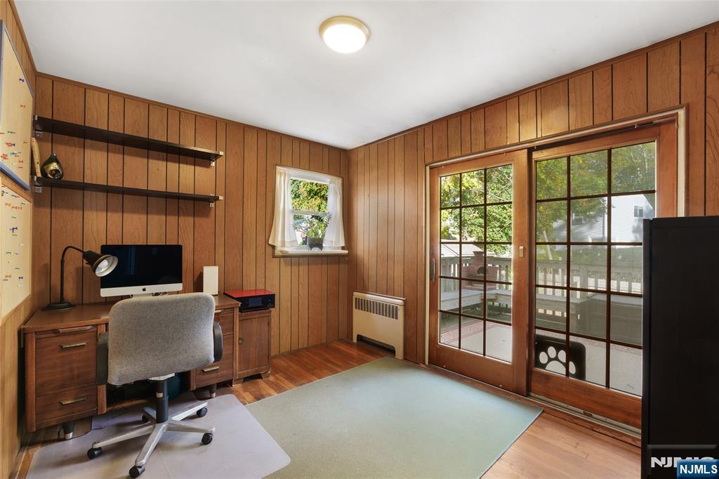 479 South Pleasant Avenue Ridgewood, NJ 07450 - Photo 11 of 26 a view of workspace with wooden floor and windows