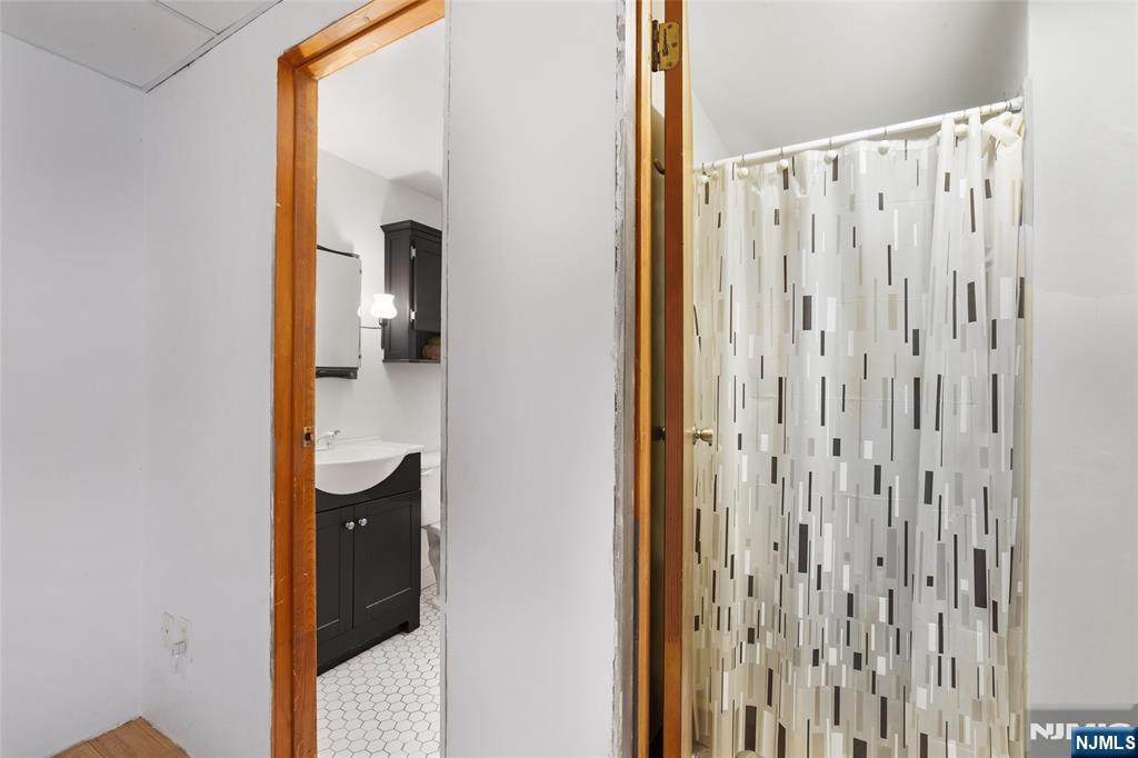 479 South Pleasant Avenue Ridgewood, NJ 07450 - Photo 17 of 26 a view of a bathroom from a hallway