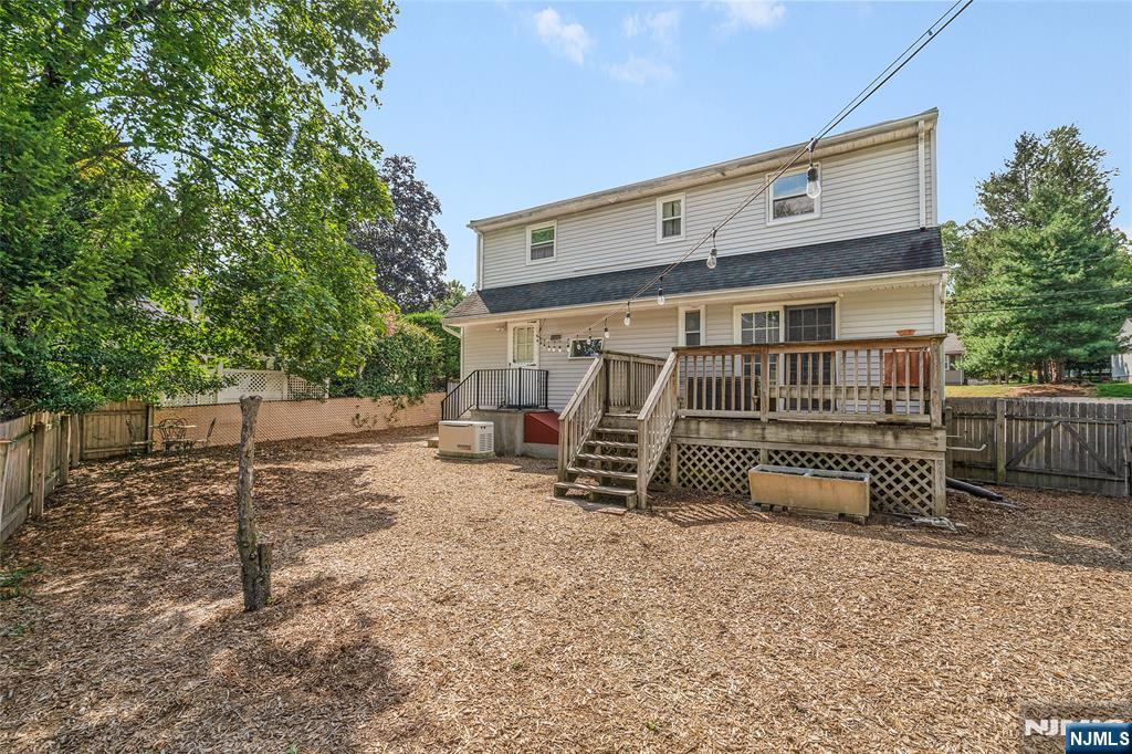 479 South Pleasant Avenue Ridgewood, NJ 07450 - Photo 24 of 26 a view of a house with backyard and sitting area