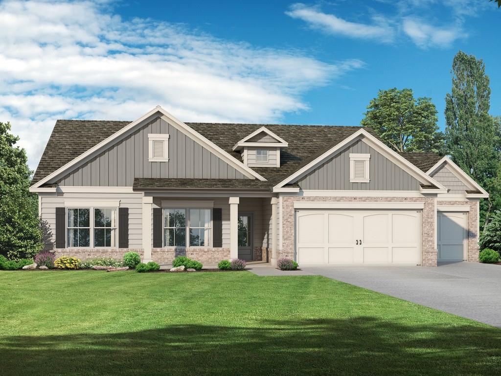 2645 John Stowe Road Monroe, GA 30656 - Photo 1 of 1 a front view of a house with a garden