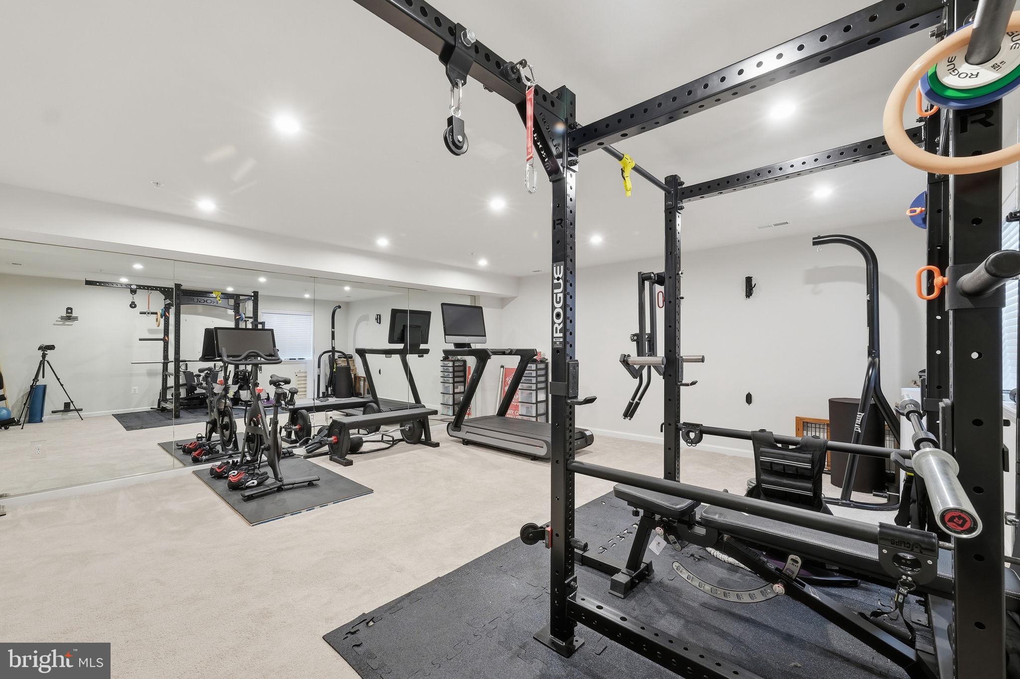 3012 Bretons Ridge Way Hanover, MD 21076 - Photo 6 of 37 a view of a room with gym equipment
