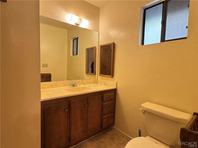 a view of a balcony with chairs