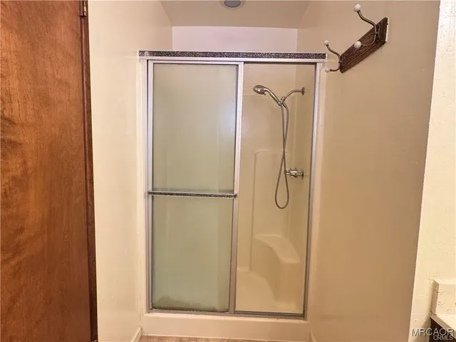 a view of a balcony with car parked