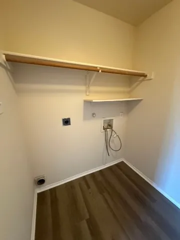 an empty room with closet area