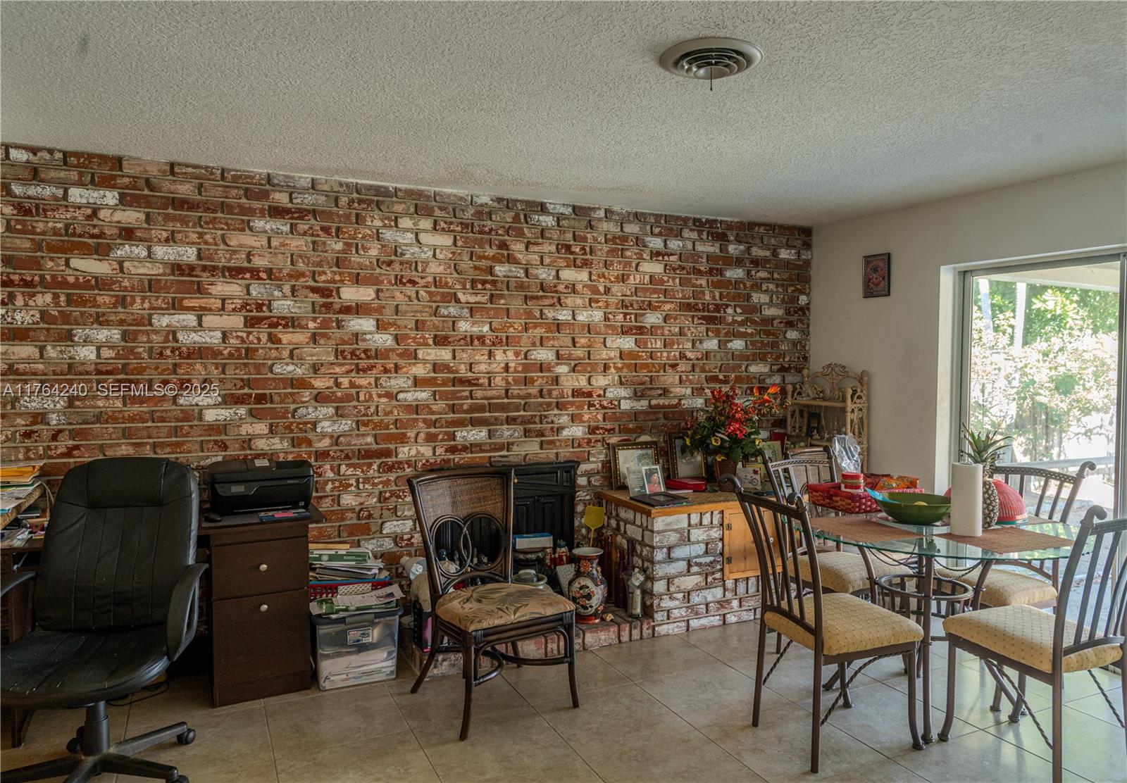 315 Southwest 12th Avenue Boynton Beach, FL 33435 - Photo 14 of 37 a view of a livingroom with furniture and a fireplace