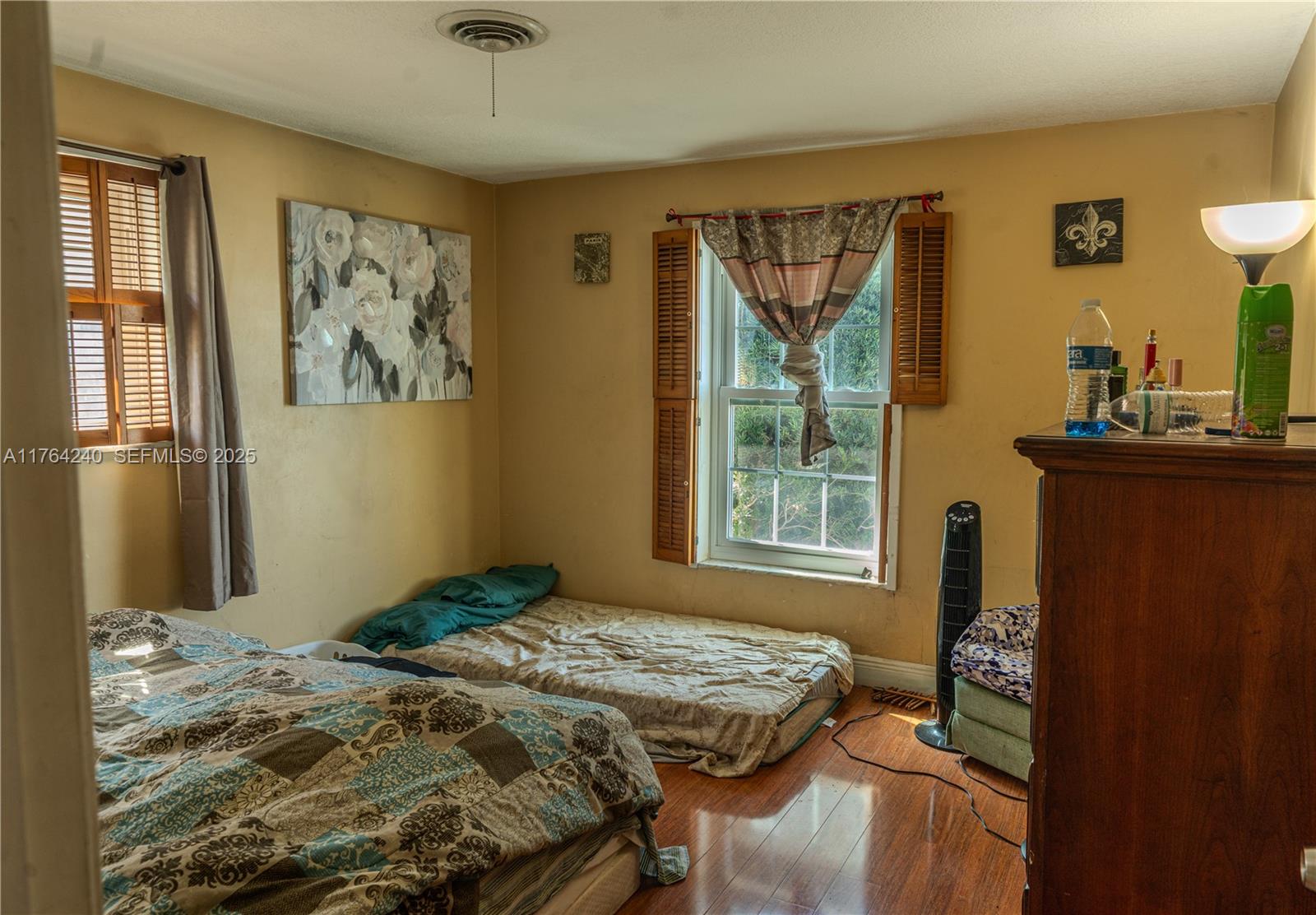 315 Southwest 12th Avenue Boynton Beach, FL 33435 - Photo 27 of 37 a bedroom with a bed and a window