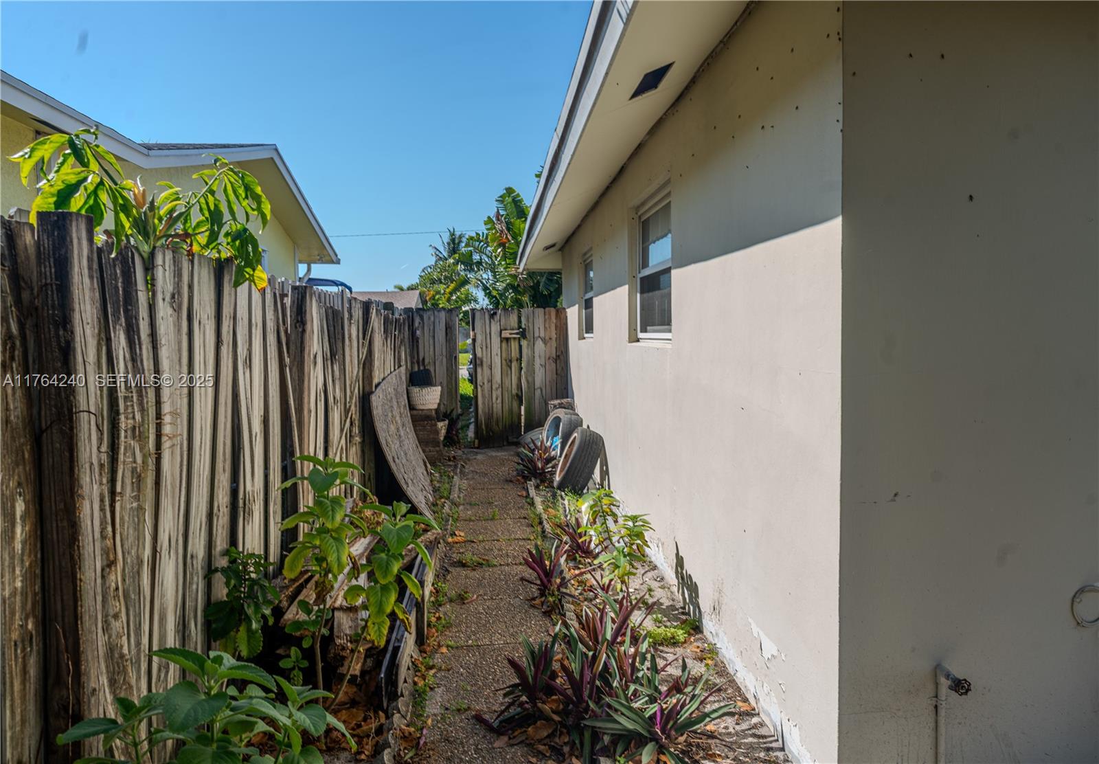 315 Southwest 12th Avenue Boynton Beach, FL 33435 - Photo 28 of 37 a view of two chairs in patio