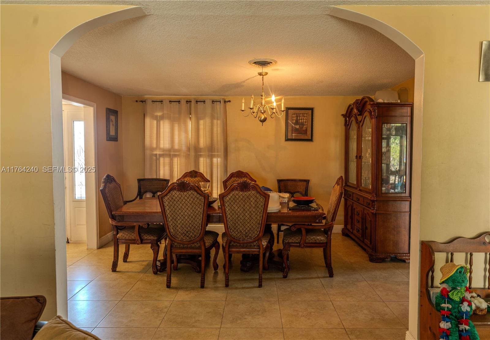 315 Southwest 12th Avenue Boynton Beach, FL 33435 - Photo 10 of 37 a view of a dining room with furniture and window