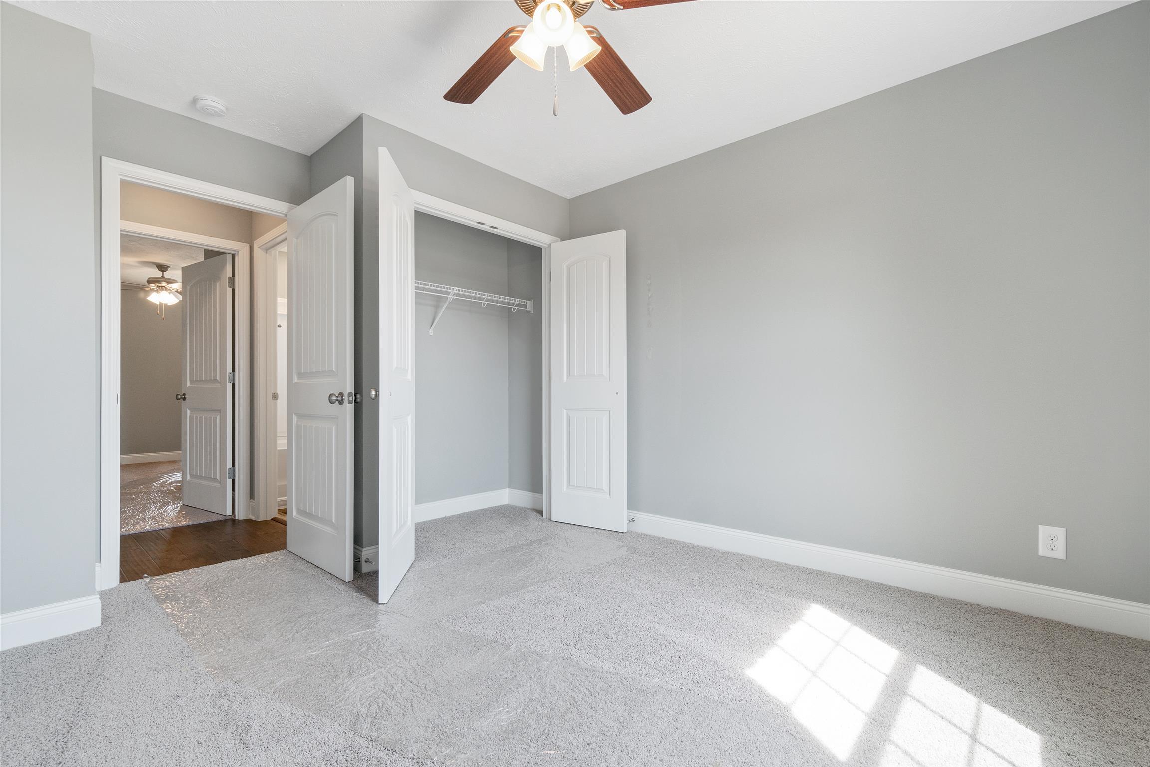 177 Fieldstone Lane Springfield, TN 37172 - Photo 11 of 27 an empty room with a empty space and a ceiling fan