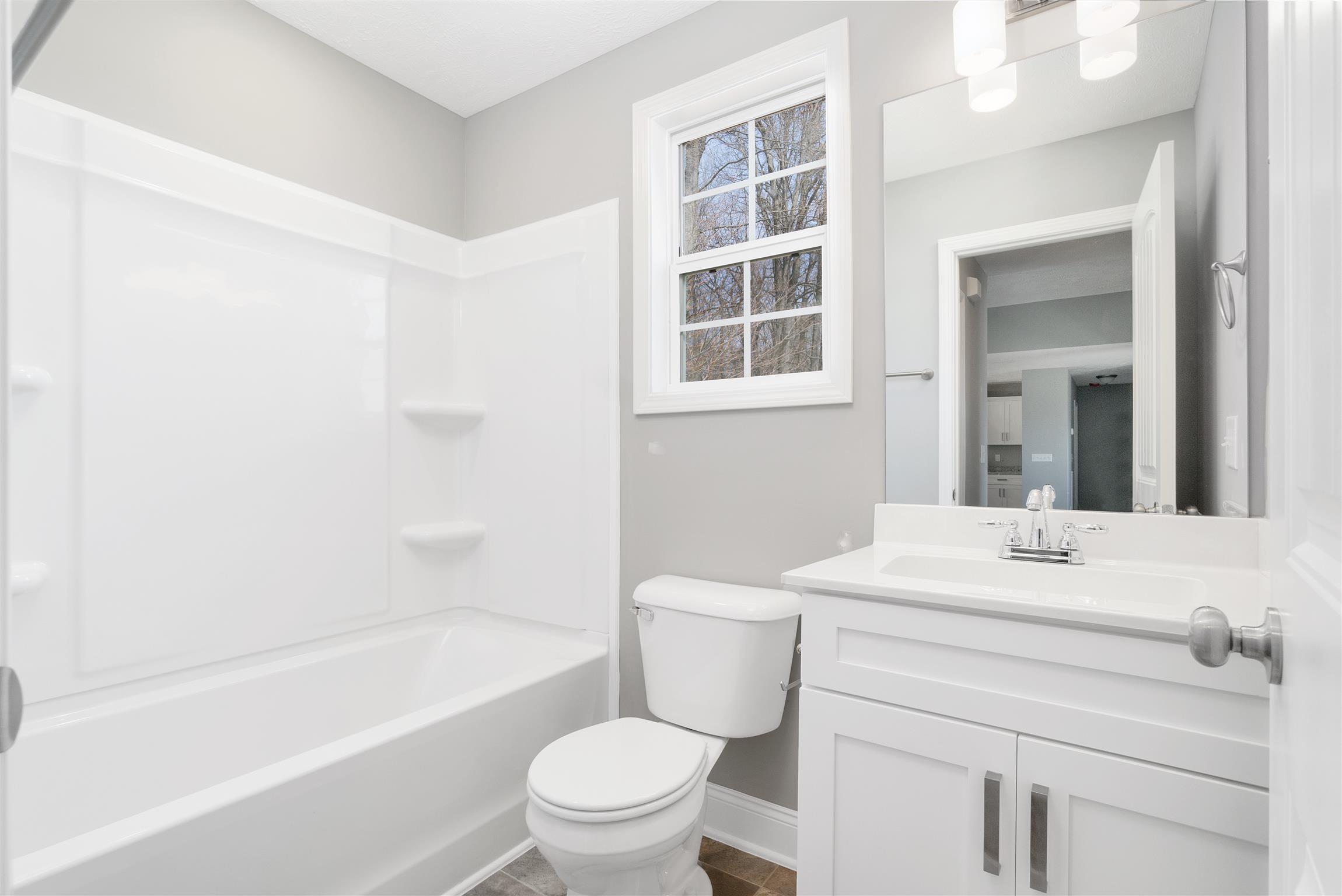 177 Fieldstone Lane Springfield, TN 37172 - Photo 13 of 27 a bathroom with a sink toilet vanity and bathtub