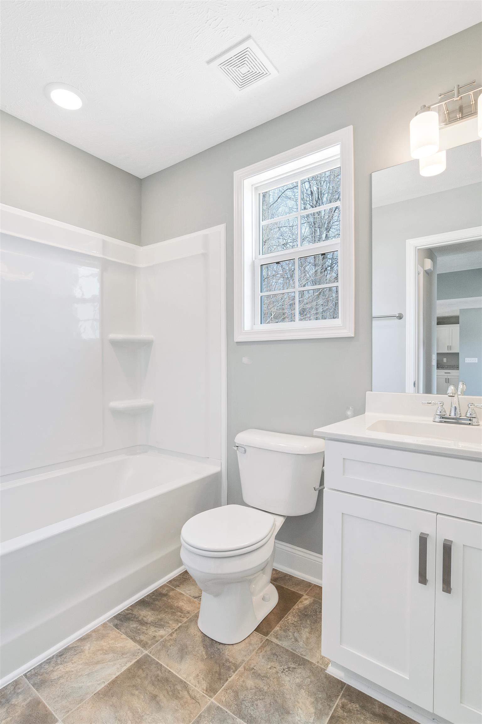 177 Fieldstone Lane Springfield, TN 37172 - Photo 14 of 27 a bathroom with a sink a toilet and a bathtub