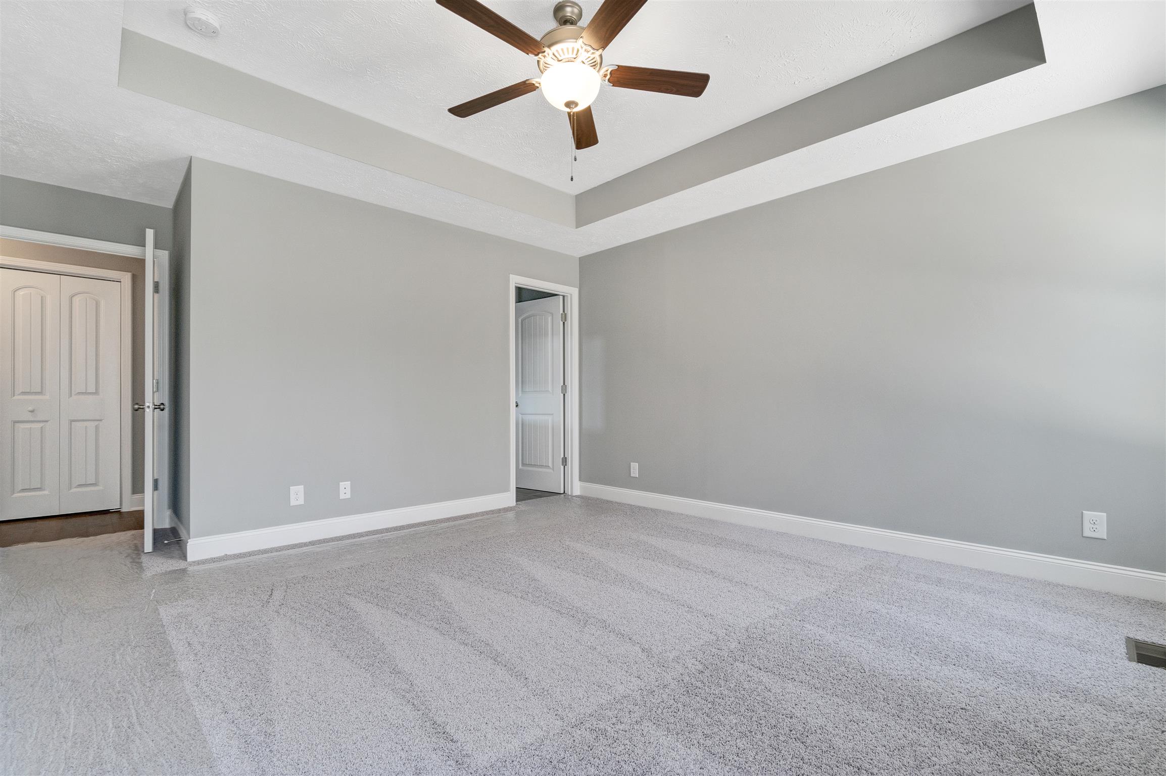177 Fieldstone Lane Springfield, TN 37172 - Photo 18 of 27 an empty room with chandelier fan