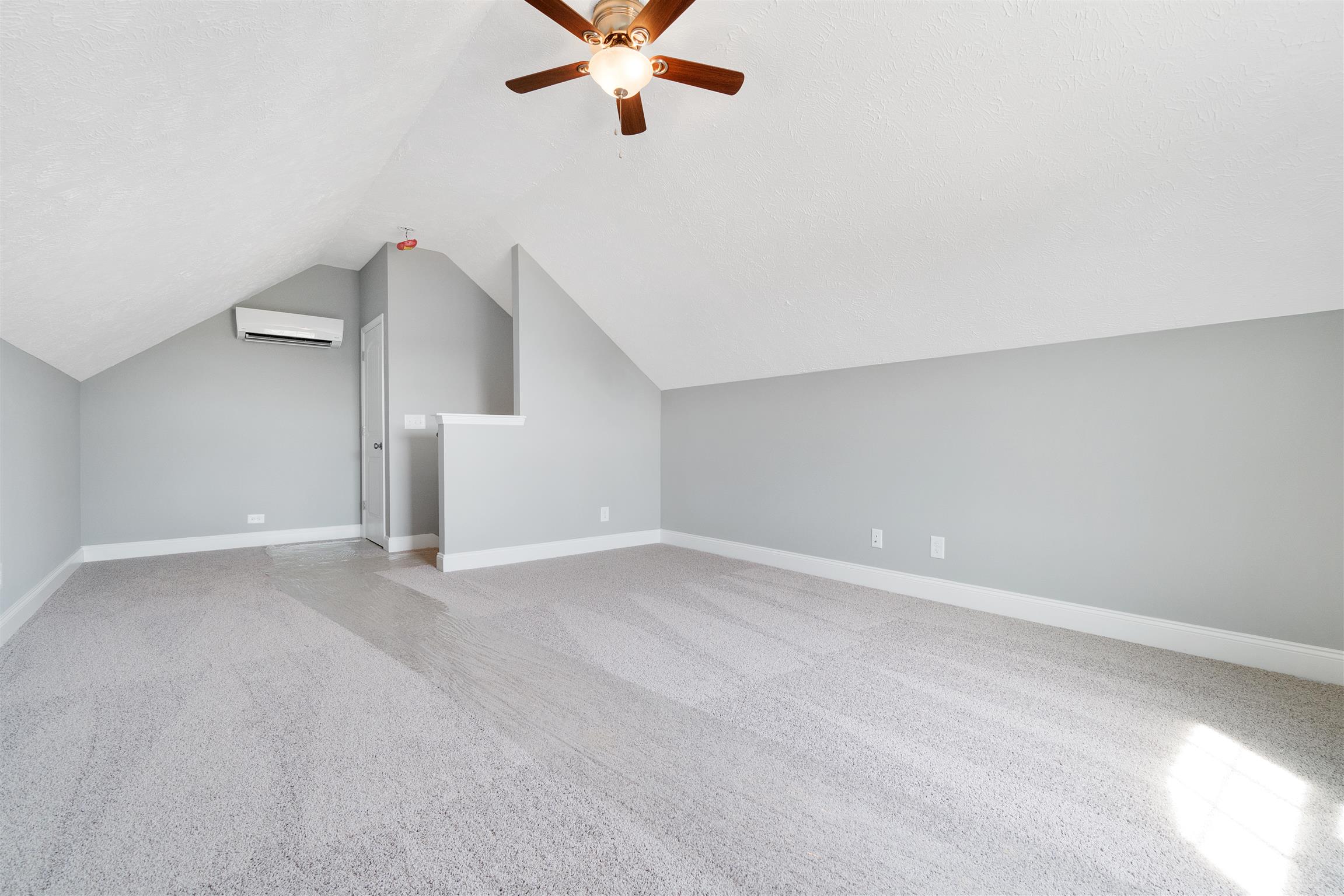 177 Fieldstone Lane Springfield, TN 37172 - Photo 26 of 27 an empty room with a ceiling fan and window