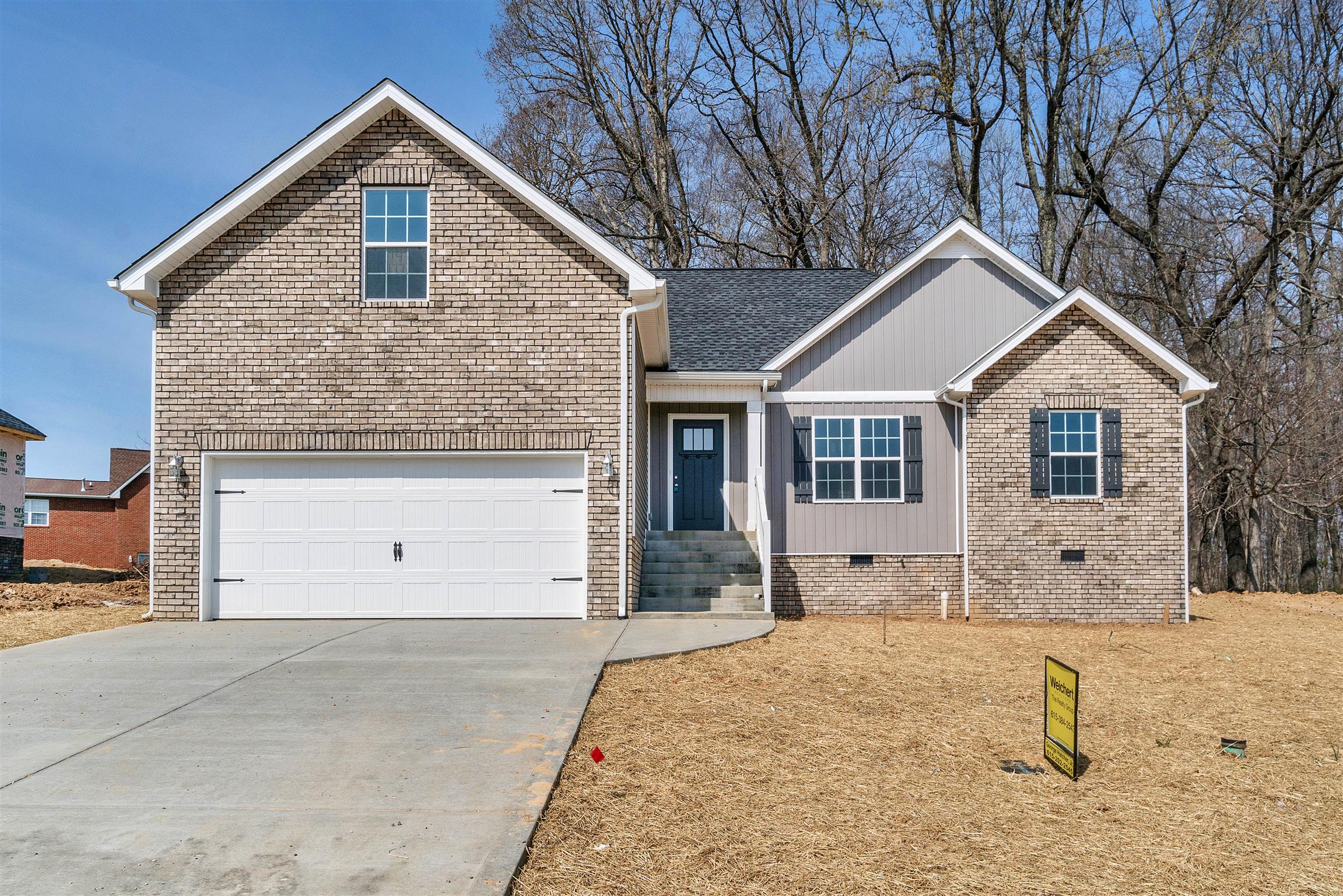 177 Fieldstone Lane Springfield, TN 37172 - Photo 3 of 27 a front view of a house with a yard