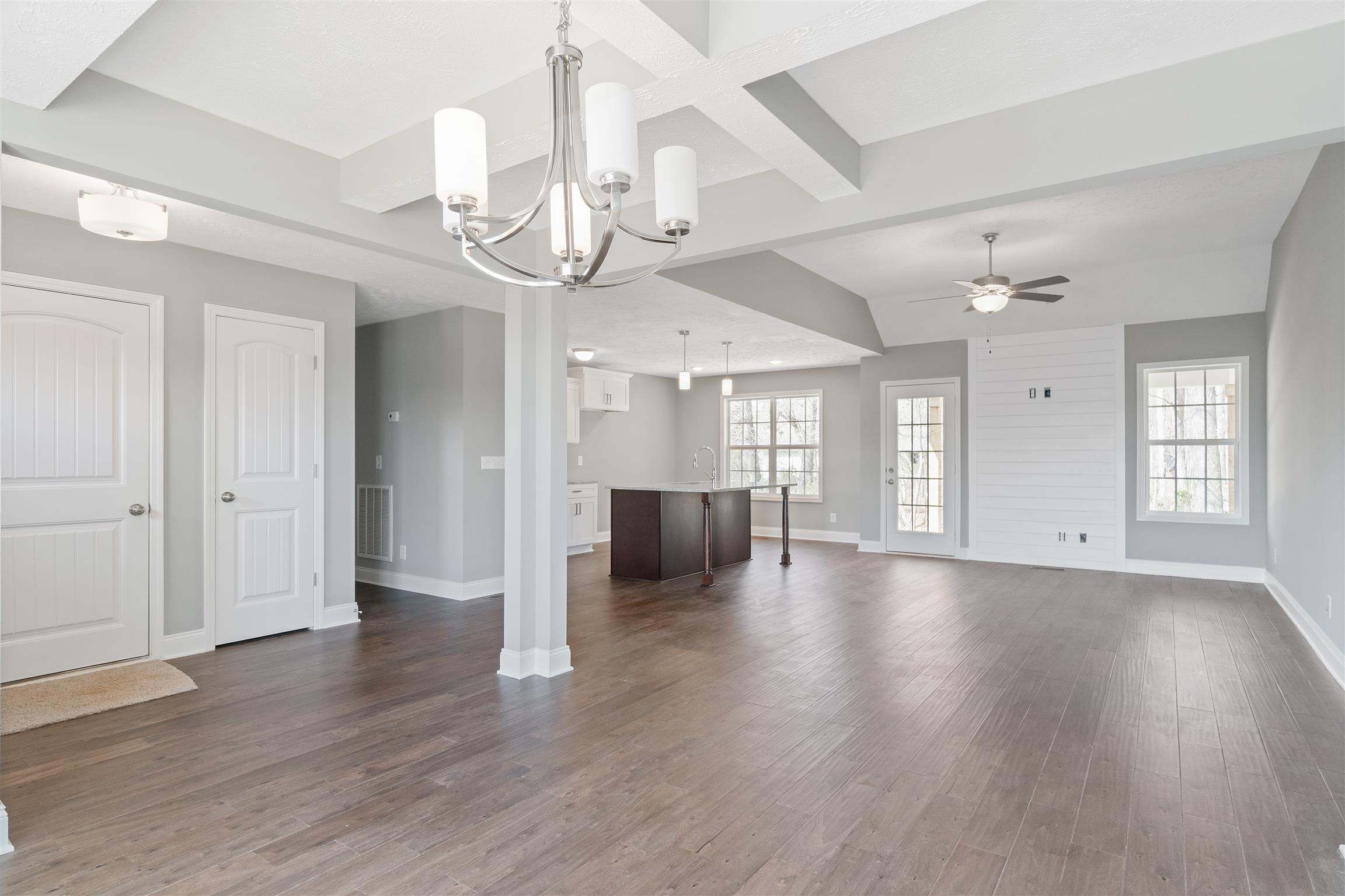 177 Fieldstone Lane Springfield, TN 37172 - Photo 10 of 27 a view of an empty room wooden floor and a chandelier