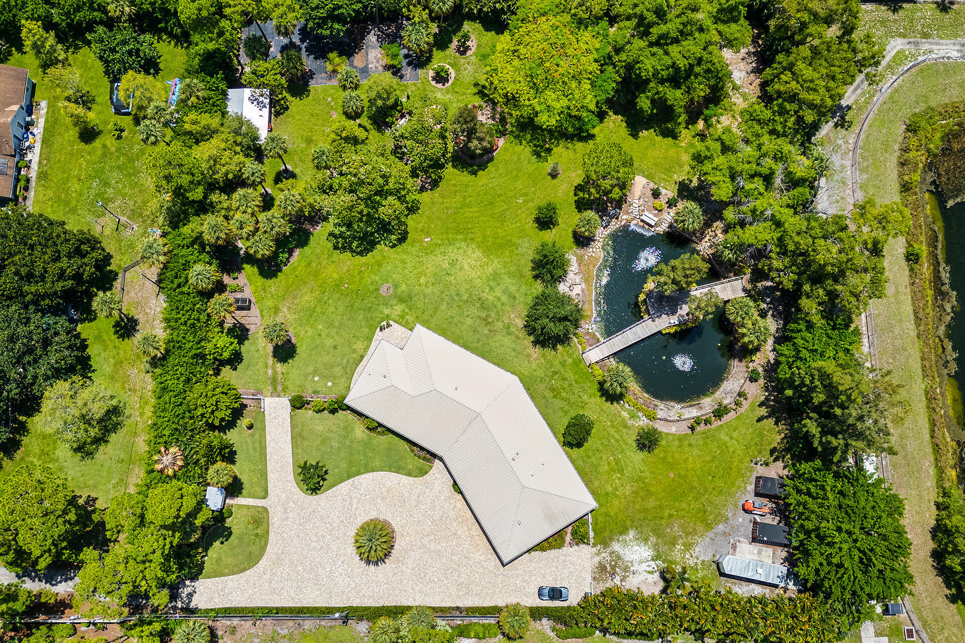 6624 Dillman Road Greenacres, FL 33413 - Photo 12 of 77 Fully Irrigated yard with 3 wells