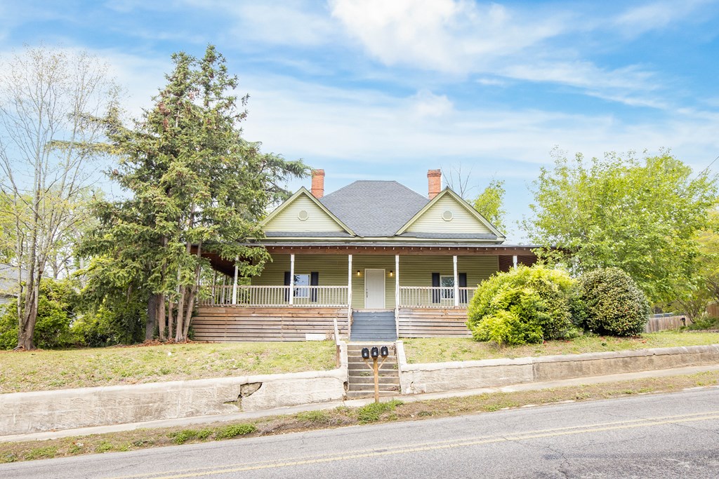 2113 Summerville Road Phenix City, AL 36867 - Photo 2 of 37 a view of a house with a garden and pathway