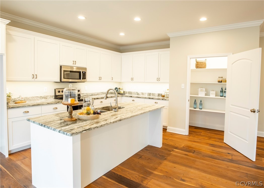 4370 Pierce Road Powhatan, VA 23139 - Photo 7 of 49 KITCHEN VIEW WITH STAINLESS APPLIANCES, GRANITE AN