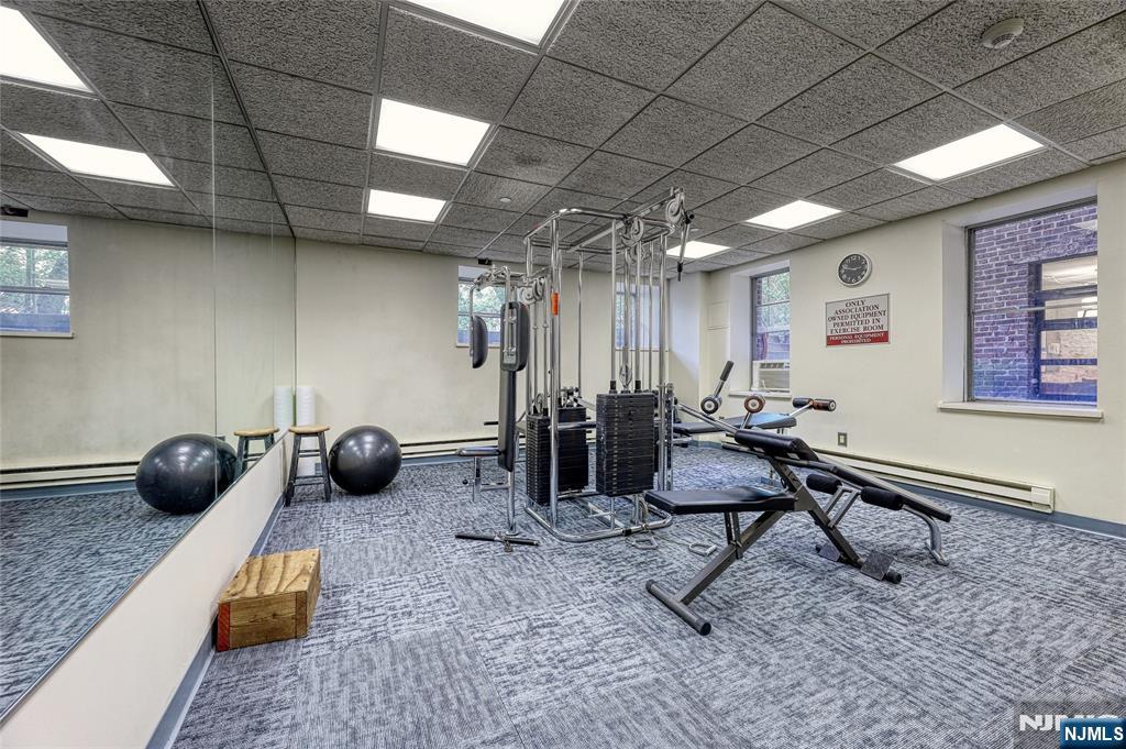 100 East Palisade Avenue, Unit D34 Englewood, NJ 07631 - Photo 12 of 12 a room with furniture and a air conditioner