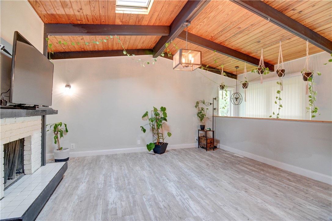 3119 East Fitzgerald Road Decatur, IL 62521 - Photo 12 of 42 a view of a room with wooden floor and a ceiling fan