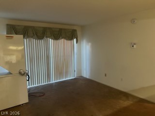 8070 West Russell Road, Unit 1057 Las Vegas, NV 89113 - Photo 2 of 10 Sun-filled living area offers ample space for relaxation and entertaining, with easy access to outdoor living.